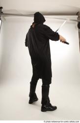 Woman Adult Average White Fighting with sword Standing poses Coat